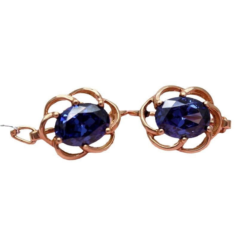 Ohrringe mit eingelegtem blauem Stein und Spitze in Lila und Gold